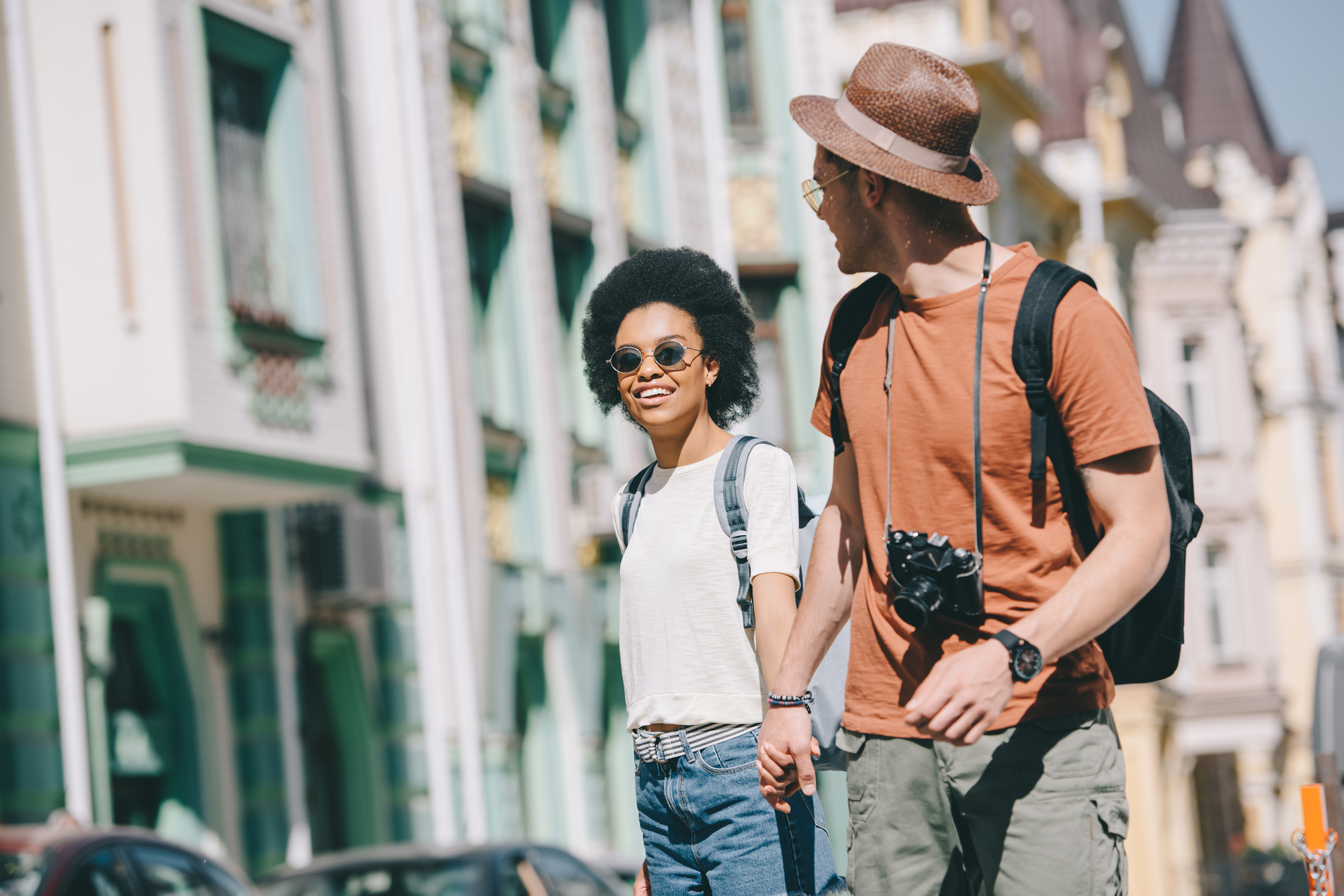 Male Traveler Camera Holding Hand African American Girlfriend