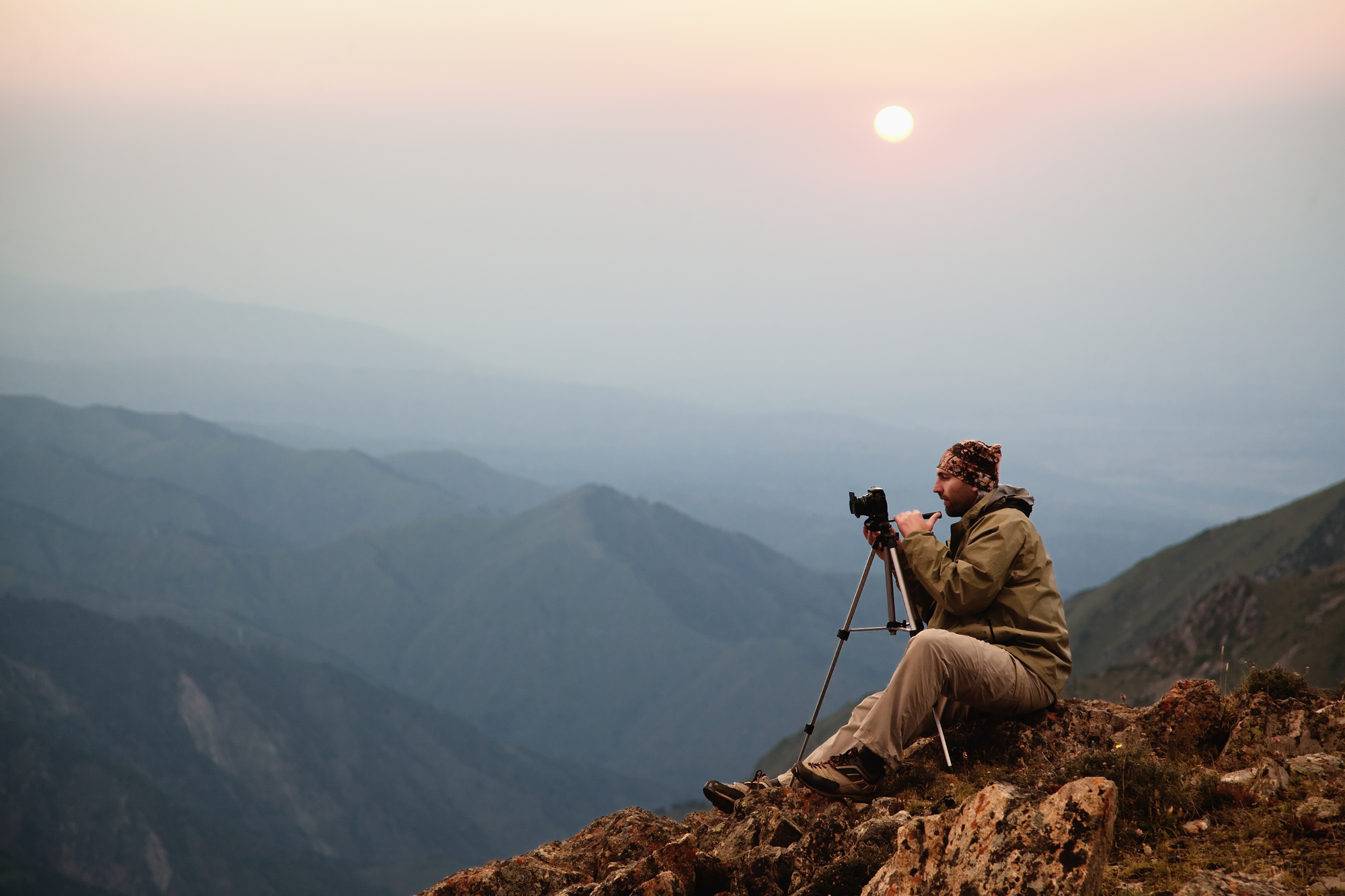 Photographer in mountains