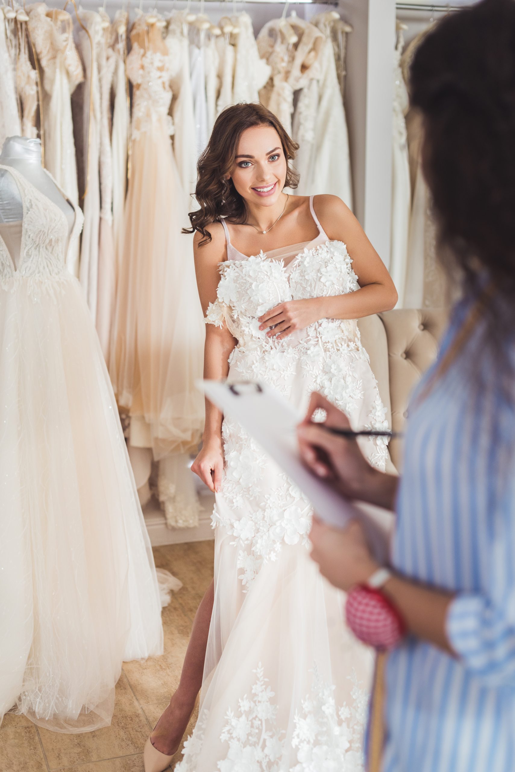 Girl trying on a wedding dress