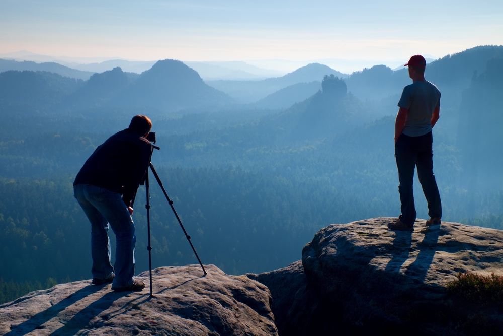 Tourist photographers in the mountains
